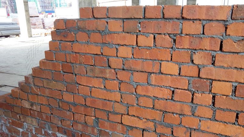 Brick Walls Vs. Stone Walls: Choosing The Right Material